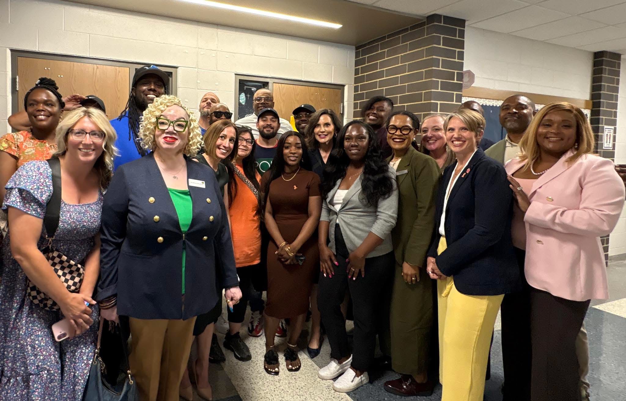 gretchen whitmer in photo with Terra Bautista and Allison Brown